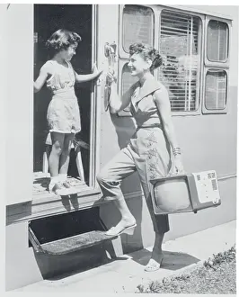 Syracuse Prints: Woman Carrying a Portable Television