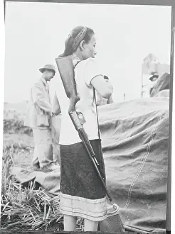 Laos Prints: Woman Carrying Rifle on Shoulder