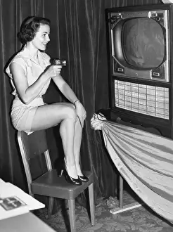 Remote Control Prints: Woman Changes Tv Channels With Remote