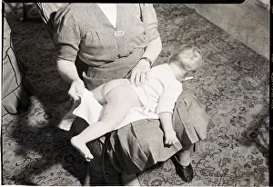 Infancy Prints: Woman Changing Baby's Diaper