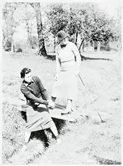 Ditch Prints: Woman Chipping Golf Ball From Rut