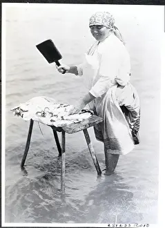 Cleaning Prints: Woman Cleaning Clothes in River