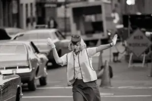 Woman Controls Street Traffic