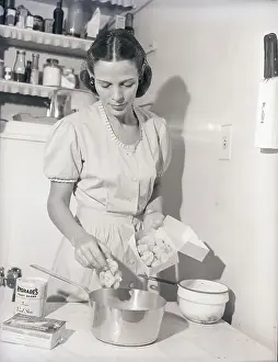 Housewife Prints: Woman Cooking Frozen Cauliflower
