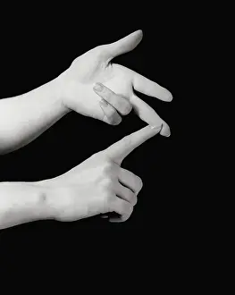 Woman counting to three on fingers