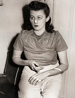 Woman with Cuts on Hand and Face
