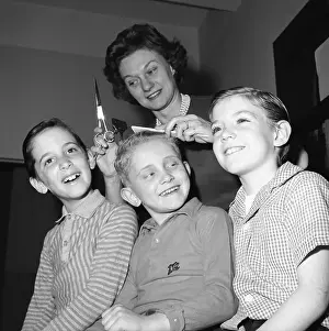 Hairdressing Prints: Woman Cutting Boys Hair at Home