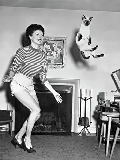 Woman Dancing with Her Cat