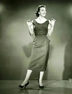 Legs Apart Prints: Woman dancing in studio, (B&W)