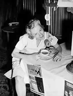 Donut Prints: Woman Demonstrating Donut Dunker; Coffee