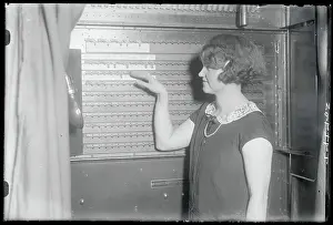 Woman Demonstrating a Voting Machine