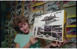 Woman Displaying Drawing of Super Secret Stealth Fighter