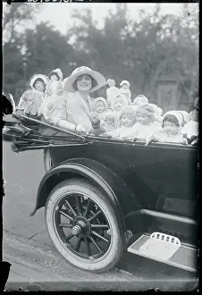 Collector Prints: Woman With Doll Collection
