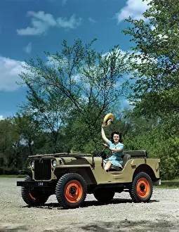 Woman Driving a Military Jeep