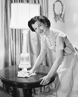 Living Room Prints: Woman dusting table