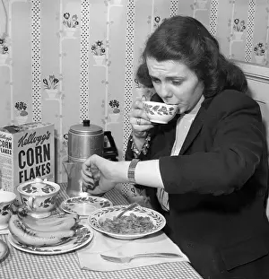 Watch Prints: Woman Eating Breakfast in a Hurry