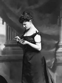 Dressed Up Prints: Woman in Evening Dress Putting on Corsage
