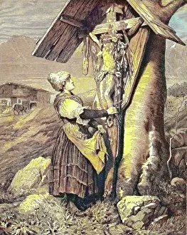 Crucified Prints: Woman in front of a field cross in the Alps