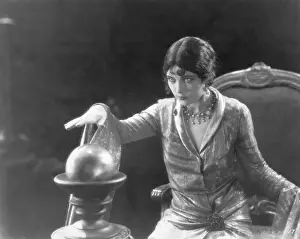 Woman Gazing Into Crystal Ball