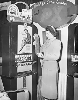 Automated Prints: Woman Getting Stockings From Machine