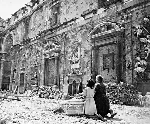 Kneeling Prints: Woman & Girl Kneeling At Ruined Church