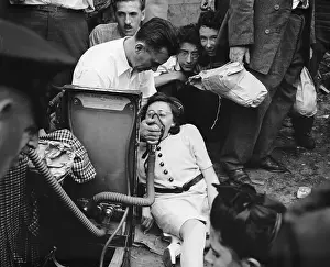 Explosion Prints: Woman Being Given Air From Inhalor