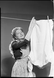 Clothesline Prints: Woman Hanging Laundry