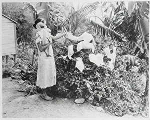 Motherhood Prints: Woman Hanging Laundry on Bush