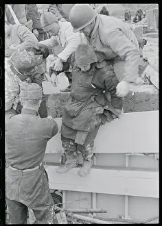 Woman Being Helped Onto Craft