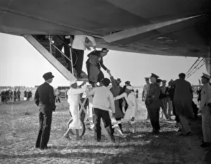 Lakehurst Prints: Woman Being Helped Out of the Hindenburg