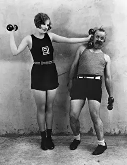 Shorts Prints: Woman Hitting Man With Dumbell