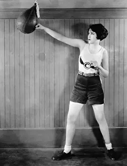 Punching Prints: Woman Hitting Punching Bag; Boxing Outfi