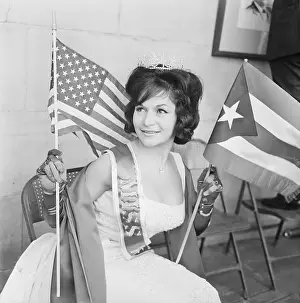 Woman Holding American and Puerto Rican Flags