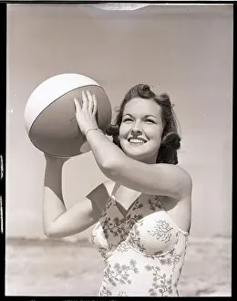 Norma Ellis Prints: Woman Holding Beach Ball