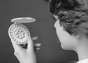Birth Control Pill Prints: Woman Holding Birth Control Pills
