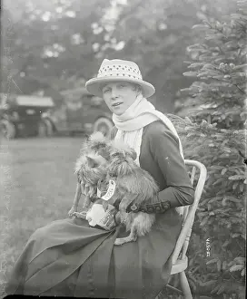 Mineola Prints: Woman Holding Three Dogs