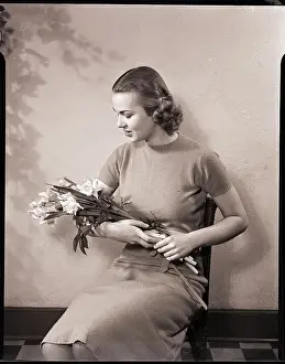 Marjorie Solms Prints: Woman Holding Flower Bouquet