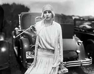 Automobile Prints: Woman Holding Long Cigarette Holder