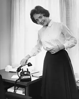 Using Phone Prints: Woman holding phone