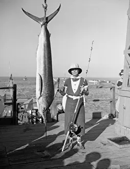 Swordfish Prints: Woman Holding Swordfish She Caught