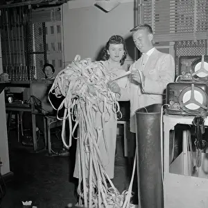 Woman Holding Ticker Tape