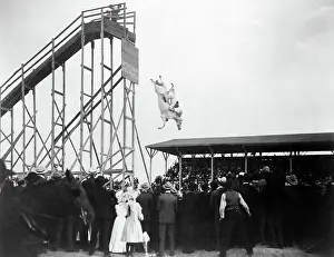 Stunt Prints: Woman On Horse Jumps Into Water Basin