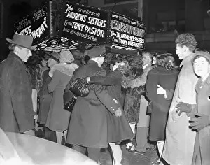 New Years Day Prints: Woman Hugging Policeman