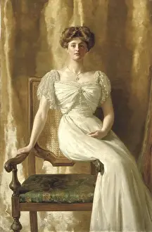 Cloth Prints: A woman in an ivory-coloured dress sits on an ornate chair against a golden background