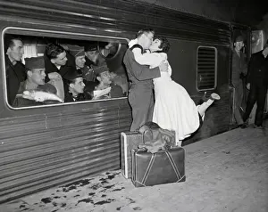 Woman Kissing GI Goodbye on Train Platform