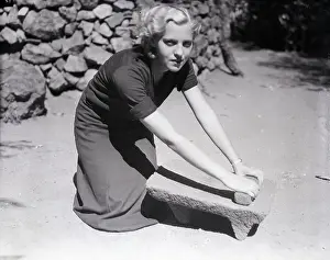 Bread Prints: Woman Kneel, On Bread Board-Type Device
