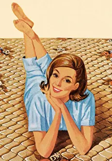 Woman Laying Across Bed