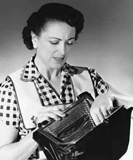 Worried Prints: Woman looking in purse