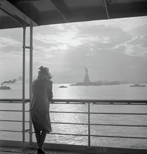 Leaning Prints: Woman Looking at Statue of Liberty from Ferry