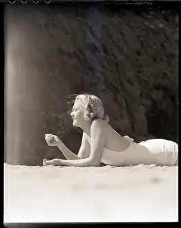Woman Lying on the Beach+